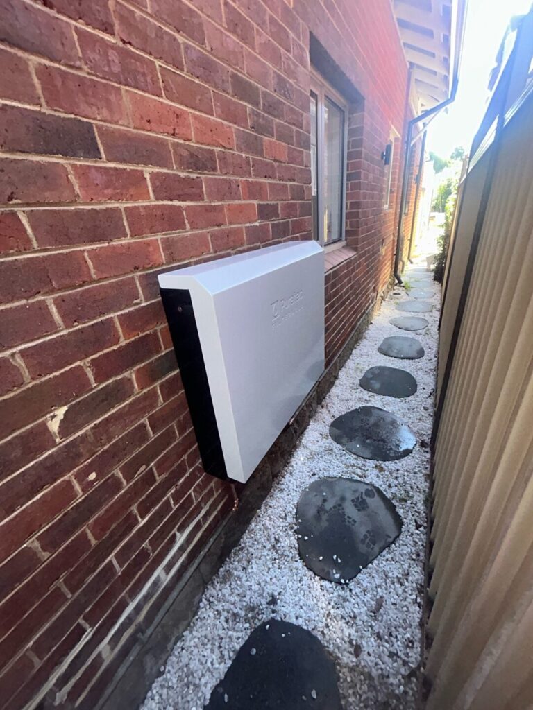 Puretec Filterwall F6 whole-house water filter installed on a brick wall in Subiaco